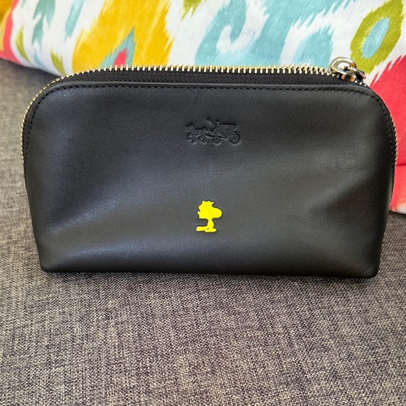 Coach Handbags - Coach Peanuts Black Cosmetic Bag with Yellow Woodstock LEATHER new
